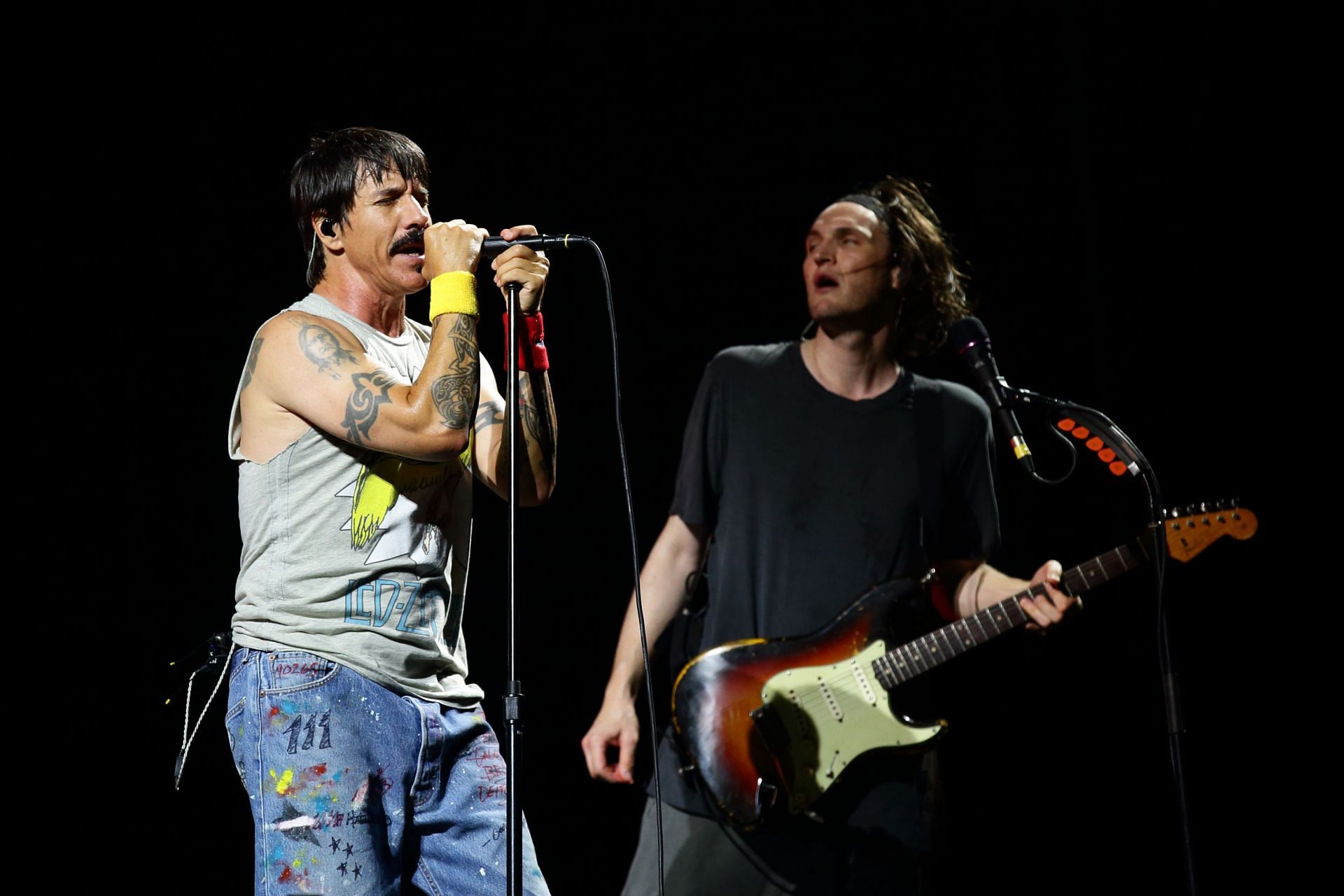 Anthony Kiedis and Josh Klinghoffer of Red Hot Chili Peppers perform at the Formula 1 Singapore Grand Prix - Live Performances: Day Three - (Image via Getty)